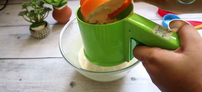 In a separate bowl, sift together flour, baking powder, baking soda, and salt.