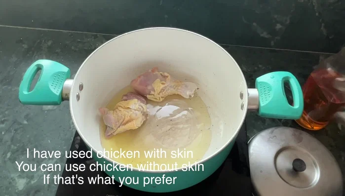 Sear chicken in oil until sealed.