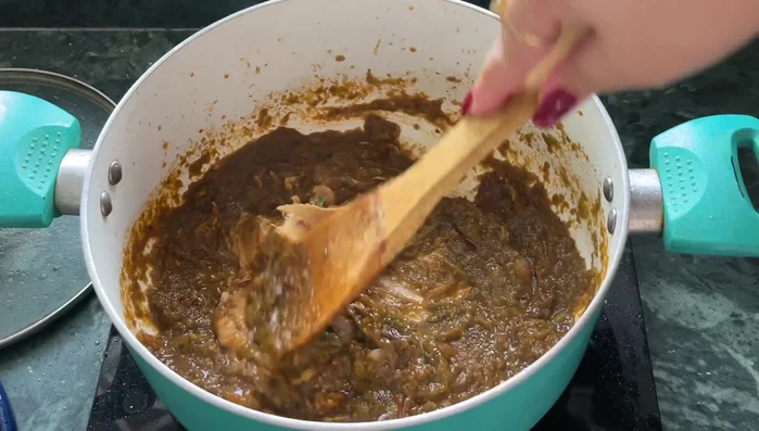 Add peanut butter, thyme, red chili powder, black pepper powder, cumin powder, and Maggi cubes.