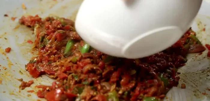 Add boiled green peas and potatoes.