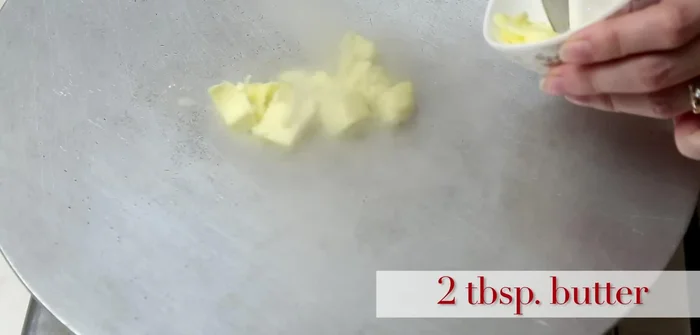 Heat butter in a pan.