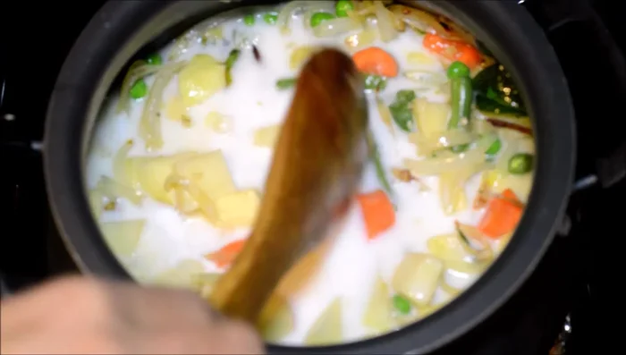 Add thin coconut milk and cook until vegetables are tender. Add salt to taste.