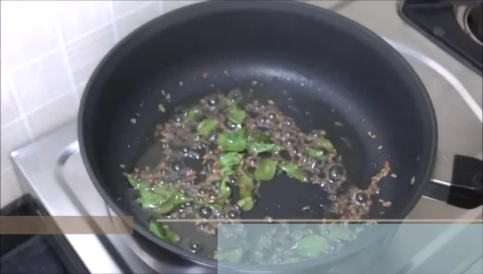 Add the chopped potatoes to the pan and fry continuously on high flame for two minutes, mixing frequently.
