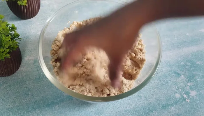 Gradually add water to form a firm, not wet, dough.
