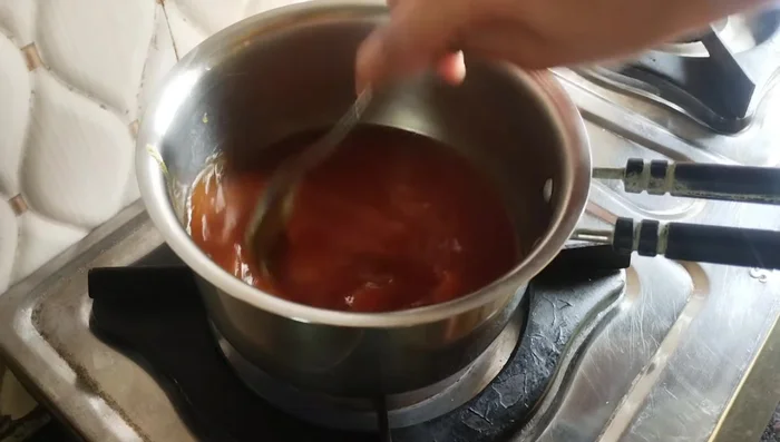 Melt the jaggery in a saucepan until smooth. No syrup needed, just melted jaggery.