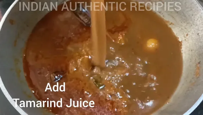 Add the spice paste to the sautéed vegetables and cook until fragrant. (This step is inferred and needs further details from the video)