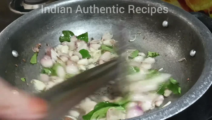 Add the tamarind pulp and salt. Mix well and let it simmer.