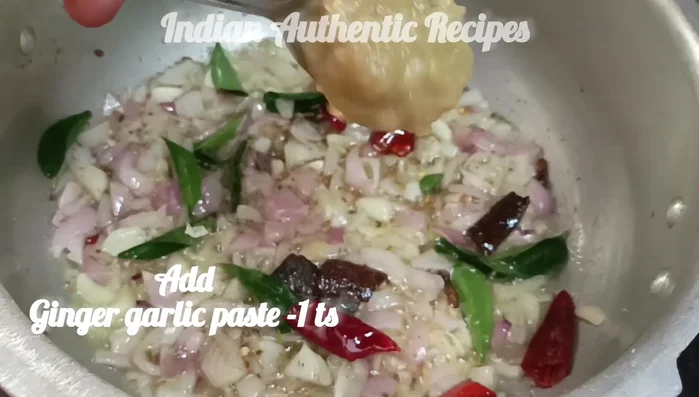 Add ginger-garlic paste and fry until the raw smell disappears.
