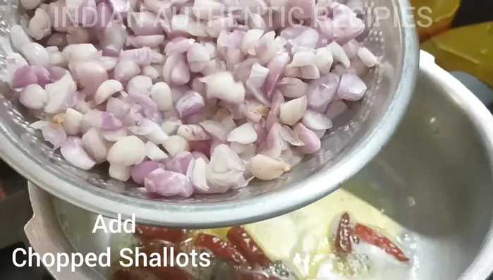 Prepare the onions, ginger-garlic paste, and green chilies. (This step is inferred; details are missing from the transcript.)