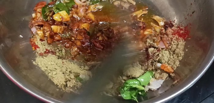 Add chili powder, coriander powder, garam masala, and turmeric powder; cook lightly on medium flame. Stir well.
