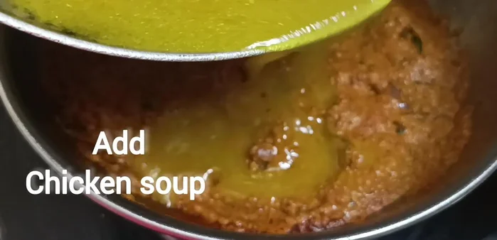 Add the cooked chicken to the spiced mixture and cook for 3-5 minutes.