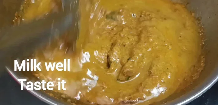 Add the previously ground spice paste. If the gravy is thick, add water as needed.