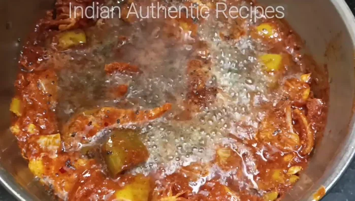 Add the grated coconut and fry until well combined.