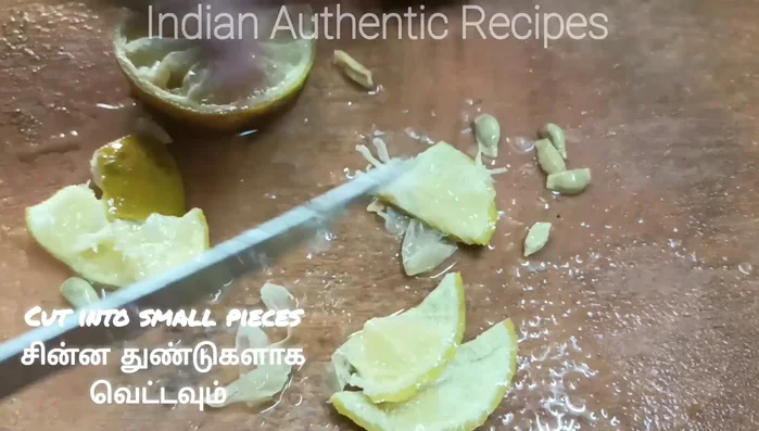Once cooled, cut the narathangai into small pieces. Remove the seeds and grind the pieces into a coarse powder using a mixer.