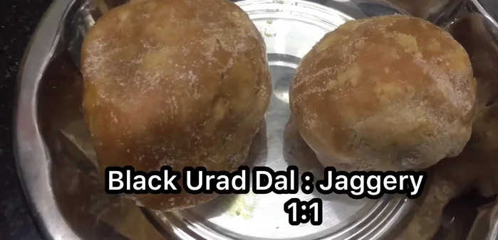 Add sugar to the cooking dal. (Further details missing)