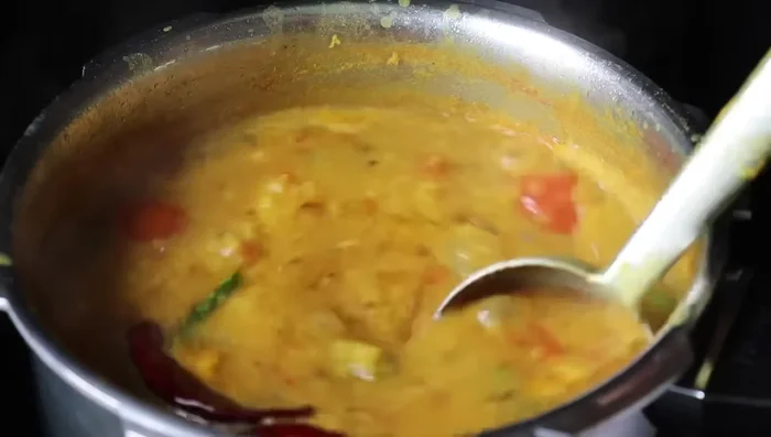 Add water and simmer until lentils are cooked.