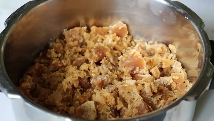 Continue cooking until the adhirasams are fully cooked and crispy.