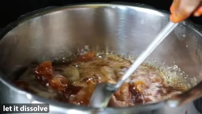 Remove the adhirasams from the pan and place them on a wire rack to cool completely.