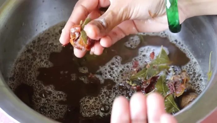 Remove the small seeds from the poonthikotta.