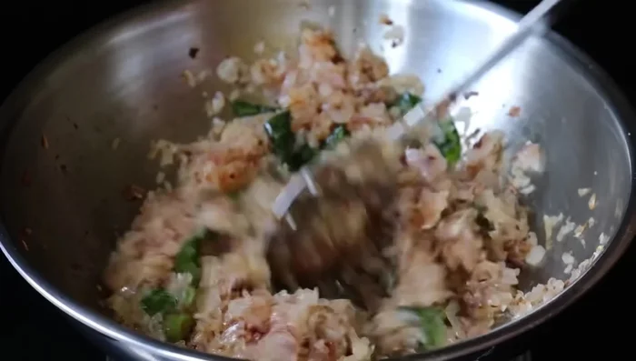 Fry the fish until golden brown.