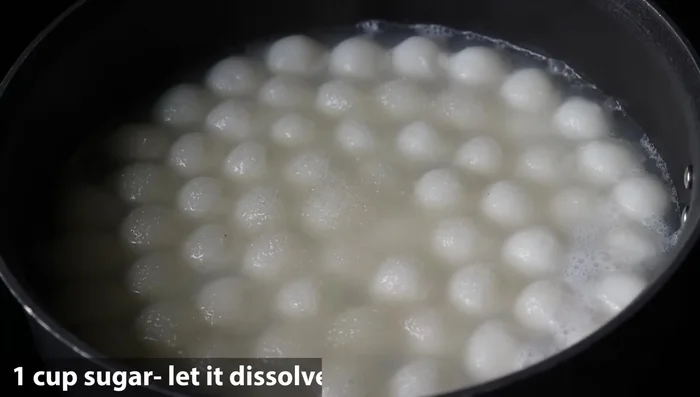 Add 1 cup of sugar (adjust to taste) and cook until boiling. (210.799)