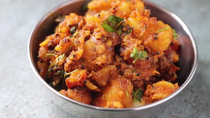 Season with salt to taste. Mix and cook until potatoes are well cooked and spices are fragrant. (Specific cooking times are missing)