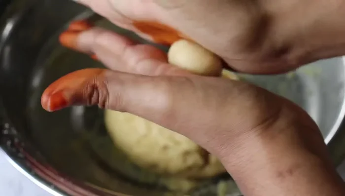Fry the gulab jamuns. (Music plays during this step)