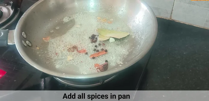 Begin cooking process. (Likely involves heating oil/ghee in pan)