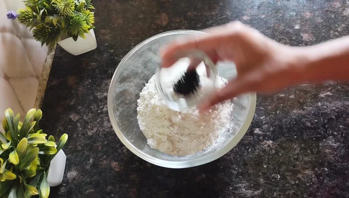Prepare the dough: Combine refined flour, nigella seeds, salt, and oil in a bowl. Gradually add water, mixing until a soft, pliable dough forms (similar to roti dough).