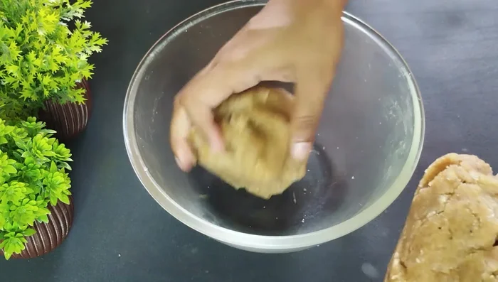 Divide the dough into two parts. Roll each part into a long cylinder of medium thickness.