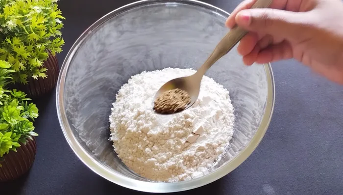 Prepare the dough: Mix refined flour (or wheat flour), salt, celery, oil (or ghee), and water to form a stiff dough (158.16).