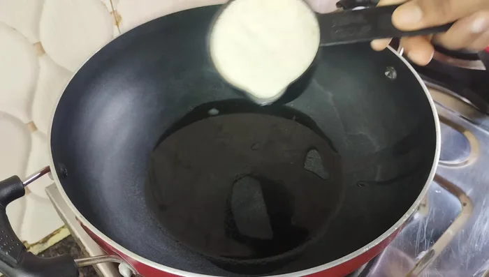 Fry the semolina: Heat 1 tbsp ghee or oil in another pan. Add 1/2 cup fine semolina and fry on low flame for 4-5 minutes until the raw smell disappears. It should remain light white.