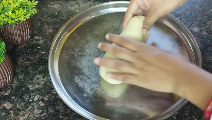 Shape the sweets: Roll the dough into small balls or any desired shape. Keep them small for even cooking.