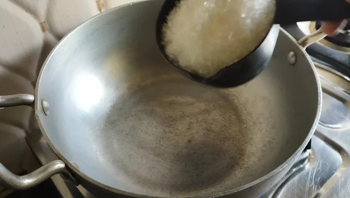 Prepare the syrup: In a pan, combine 1 cup sugar and 1 cup water. Heat on low flame until sugar dissolves. Add crushed cardamom, yellow food color (optional), and bring to a boil. The syrup doesn't need to be thick.