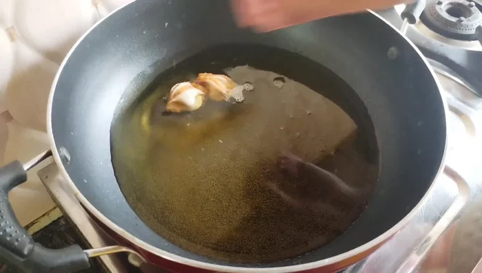 Heat oil in a pan. Fry the flower samosas in batches on low heat until golden brown and crispy. This takes about 4-5 minutes per batch.