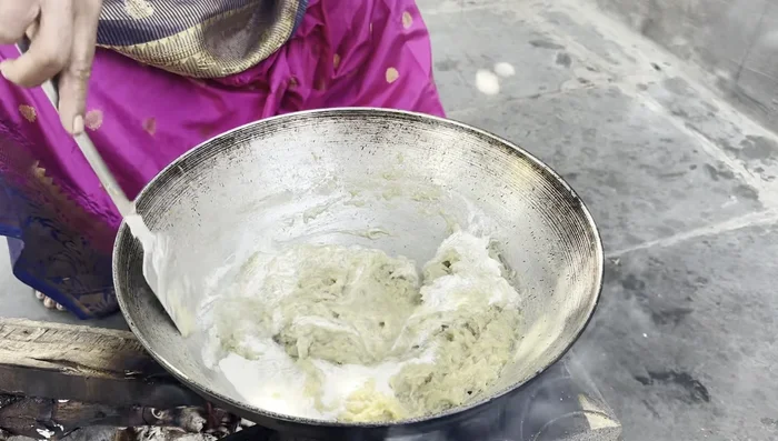 Add fresh cream (or milk or khoya for a softer halwa).