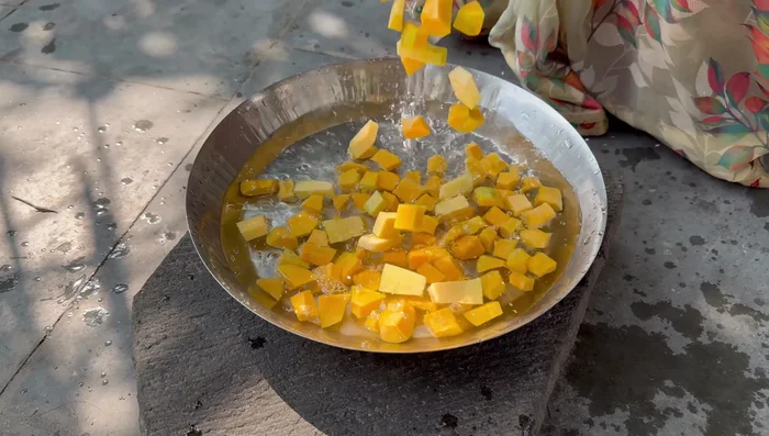 Wash the chopped pumpkin pieces with water.