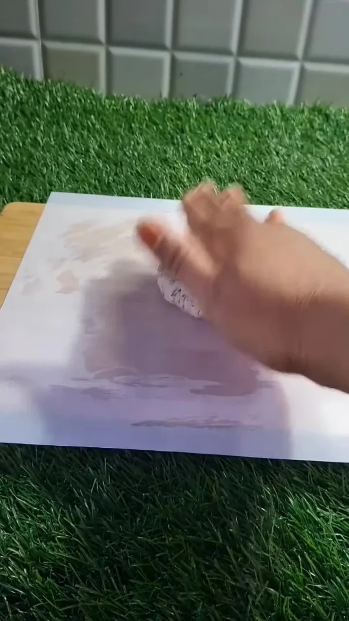 Spread the dough on a butter paper.