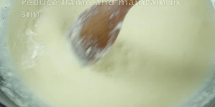 Once the milk has reduced considerably, increase the heat slightly to a sticky consistency, continuing to stir to prevent burning.