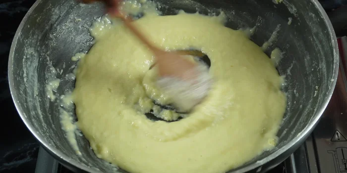 Add one tablespoon of sugar and stir well. If the mixture is too thick, add a little more sugar to loosen it. Add a teaspoon of ghee to add moisture.