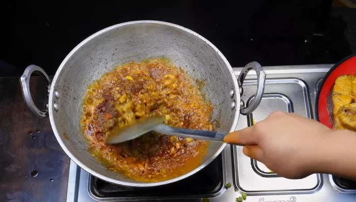 Prepare the Biryani rice (cooking method not explicitly detailed in the transcript).
