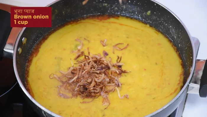 Add the brown onions to the dal.