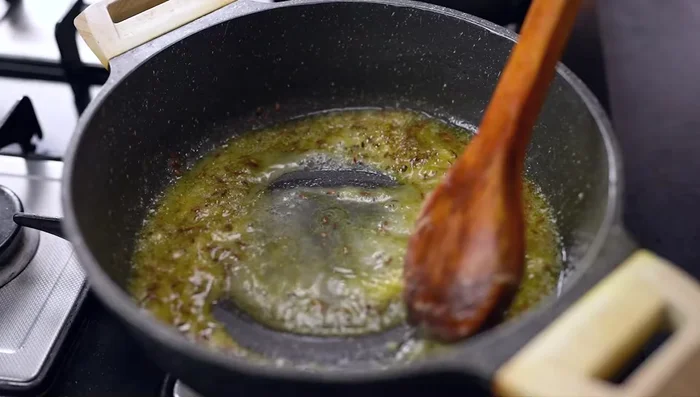 Add ginger-garlic paste, a little water, and cook until the water evaporates.
