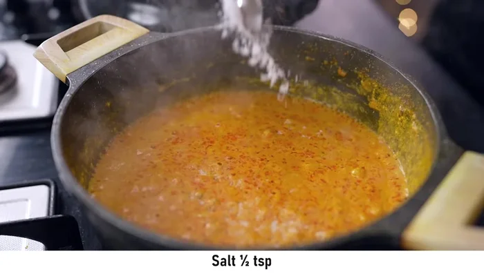 Season with salt. Add green chilies for freshness.