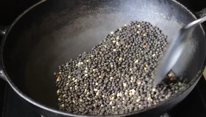 Heat a pot or pan over medium heat.