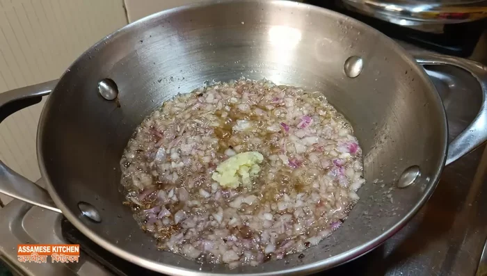 Add ginger-onion paste, Khini, turmeric powder, and fry until brown (approx. 10 minutes). Add more ginger powder.
