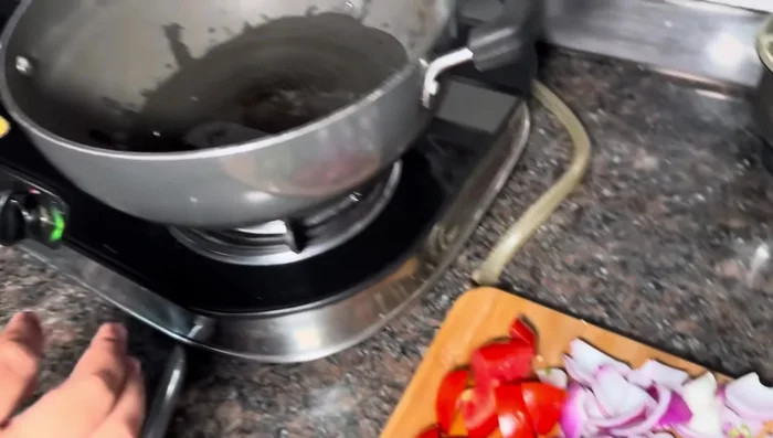 Add spices and sauces to the gravy base and cook till it thickens.