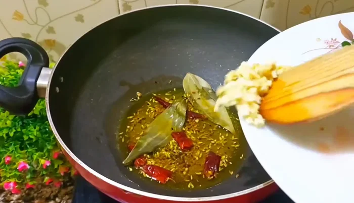 Add finely chopped ginger and fry until fragrant.