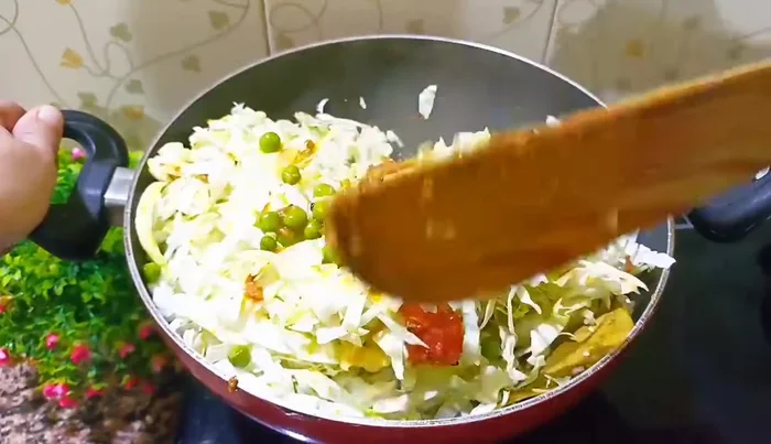 Add salt and mix well. Continue cooking until cabbage is tender.