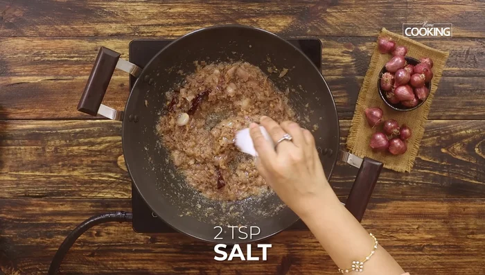 Add salt, red chili powder, and turmeric powder. Mix well.